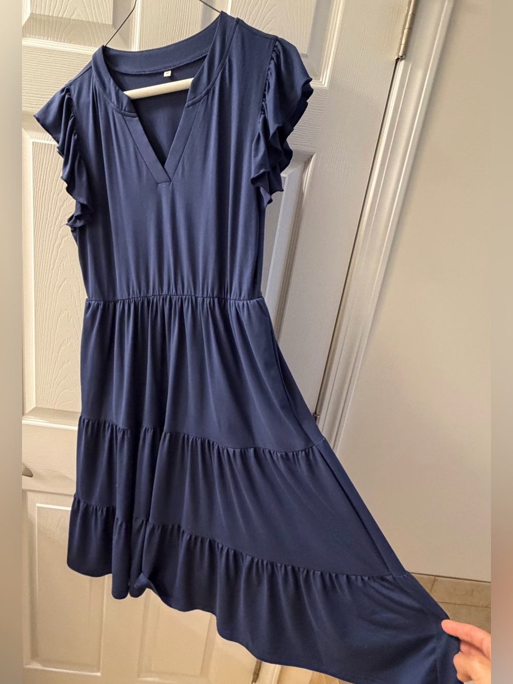 Navy blue tiered dress with ruffle sleeves, size M